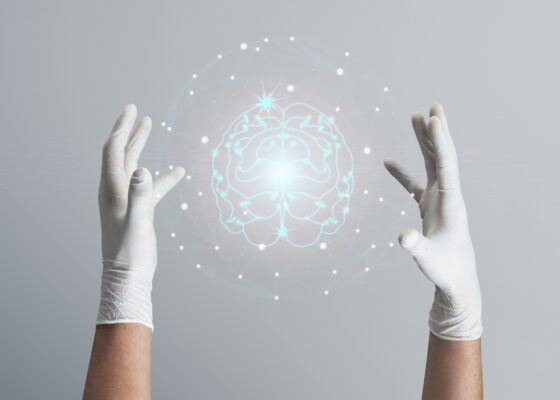 Hand holding AI hologram brain futuristic technology